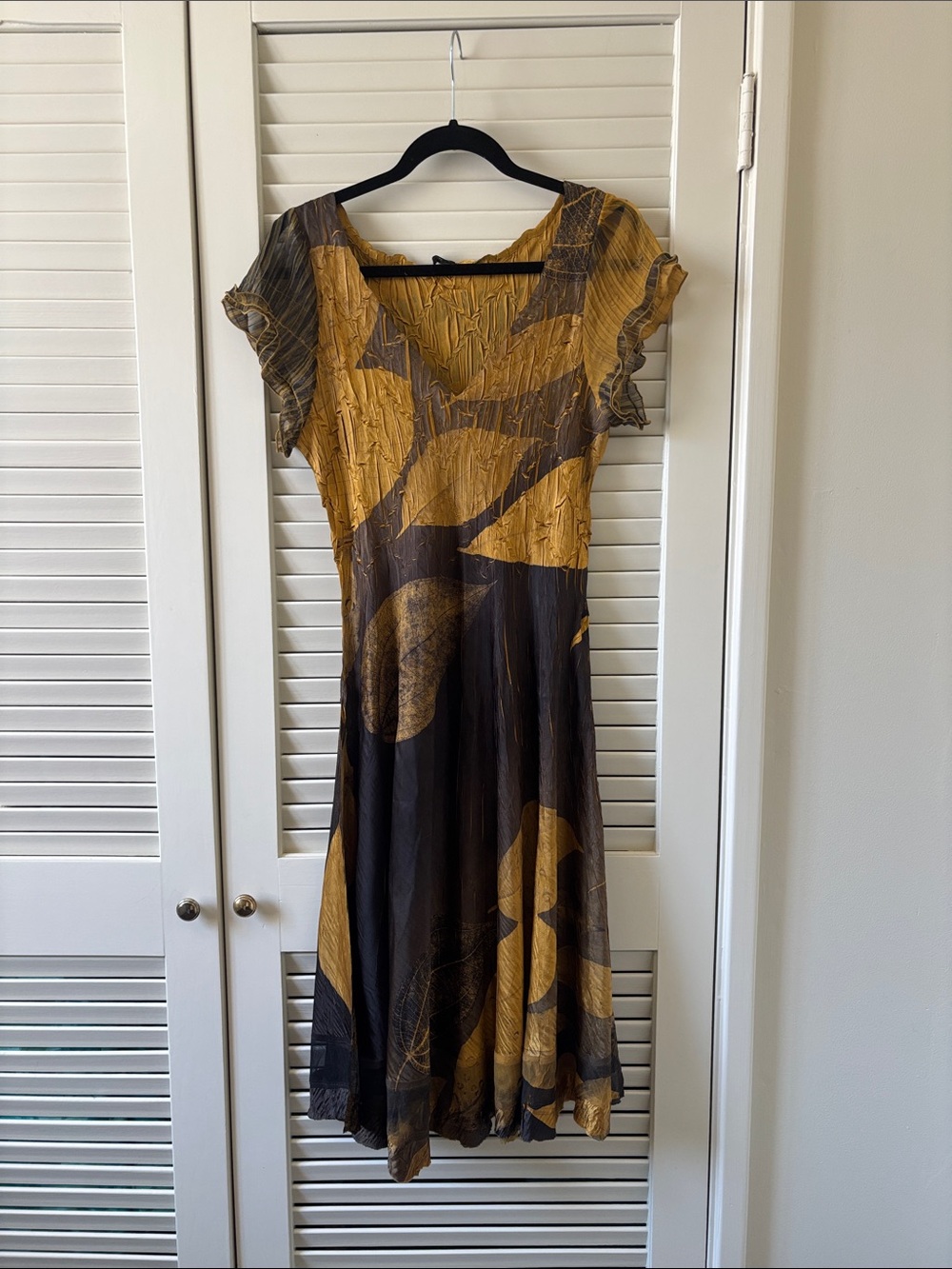 Komarov black and gold leaf print Dress